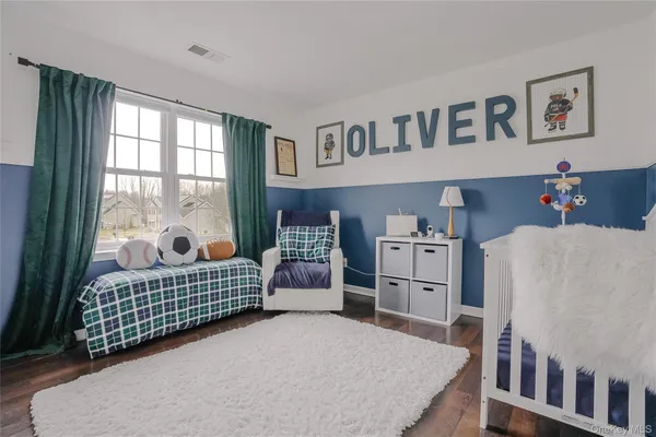 a bed room with a bed and a window