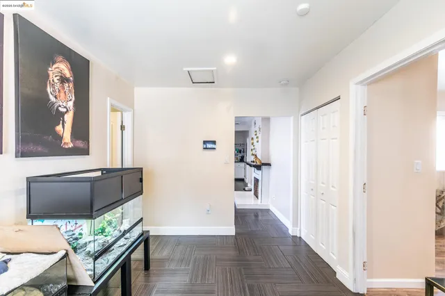 a bathroom with a sink toilet and a mirror