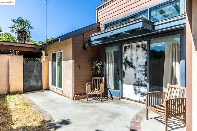 a view of hotel room and glass door