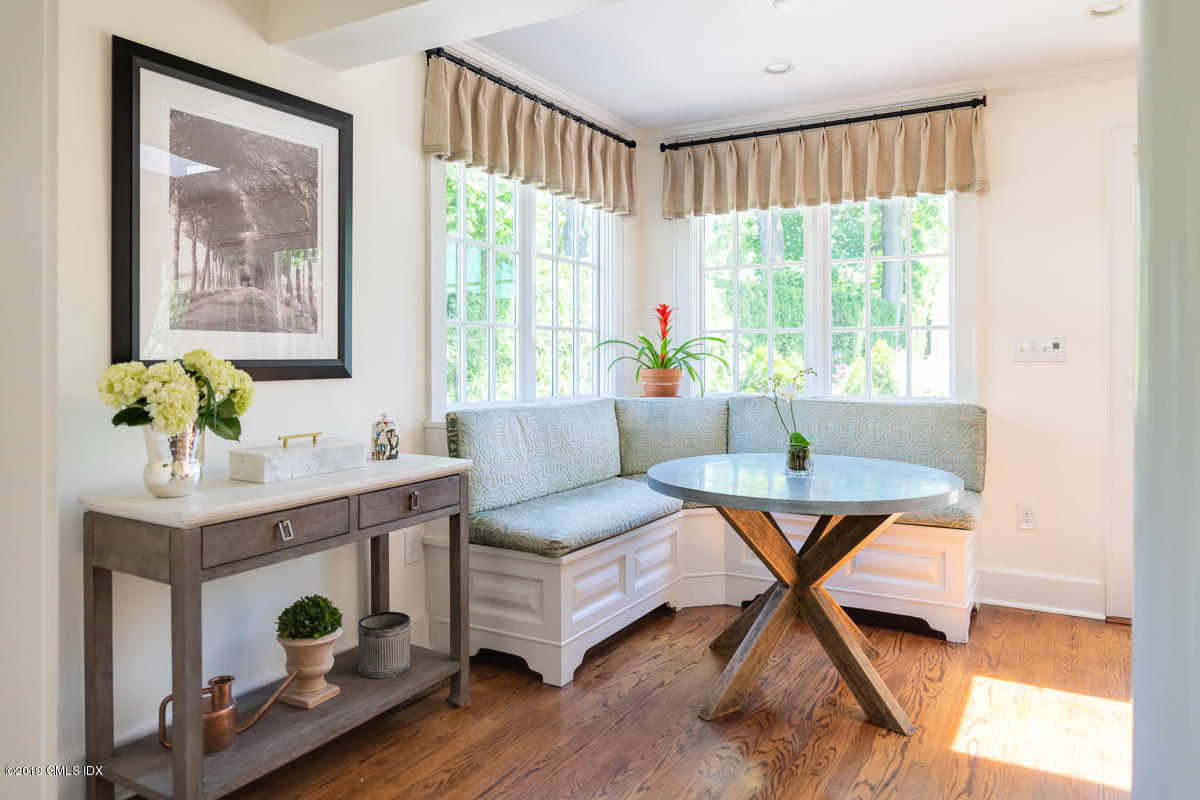 23 Maher Avenue Greenwich, CT 06830 - Photo 18 of 51 a living room with furniture and a window