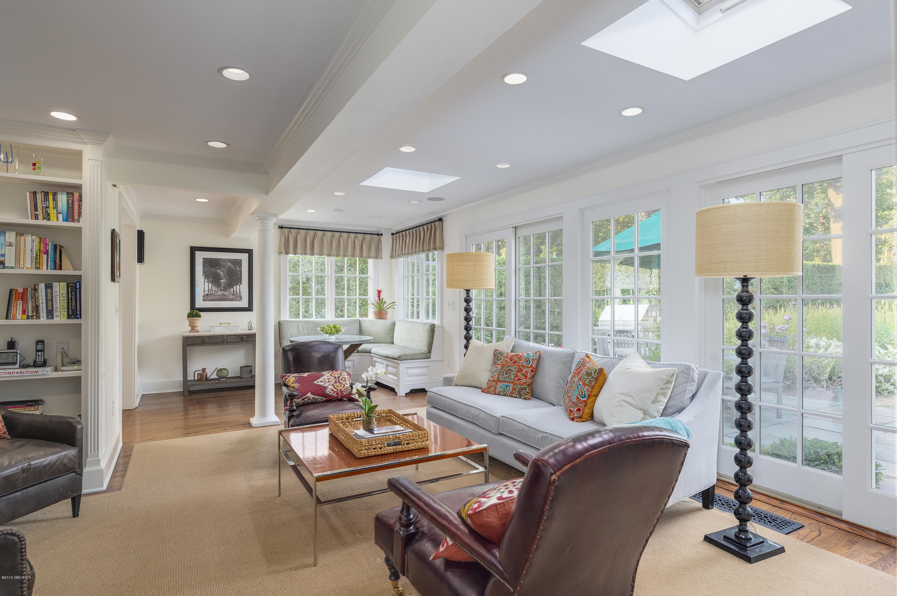 23 Maher Avenue Greenwich, CT 06830 - Photo 20 of 51 a living room with furniture and a large window