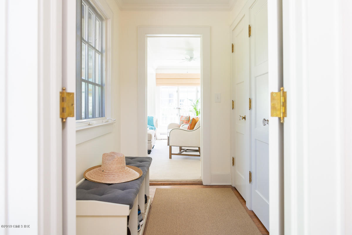 23 Maher Avenue Greenwich, CT 06830 - Photo 23 of 51 a hallway with furniture and a window