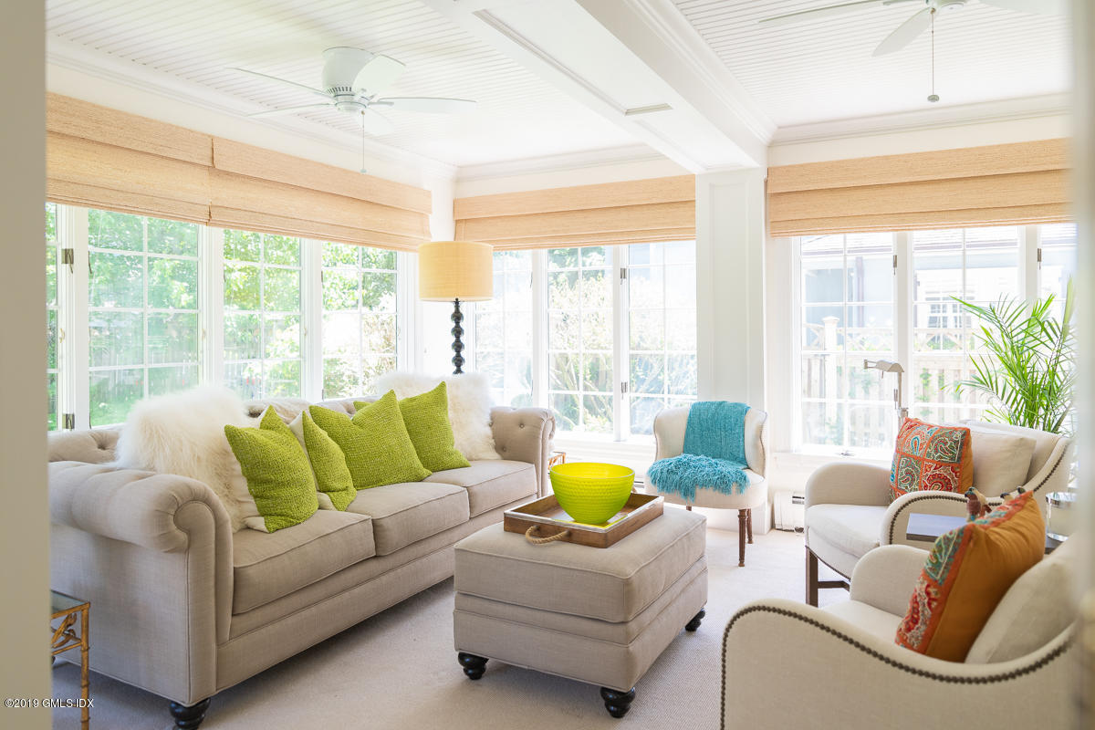 23 Maher Avenue Greenwich, CT 06830 - Photo 24 of 51 a living room with furniture and a large window