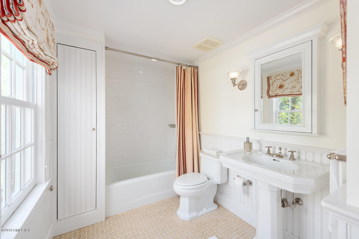 23 Maher Avenue Greenwich, CT 06830 - Photo 28 of 51 a bathroom with a sink toilet and shower