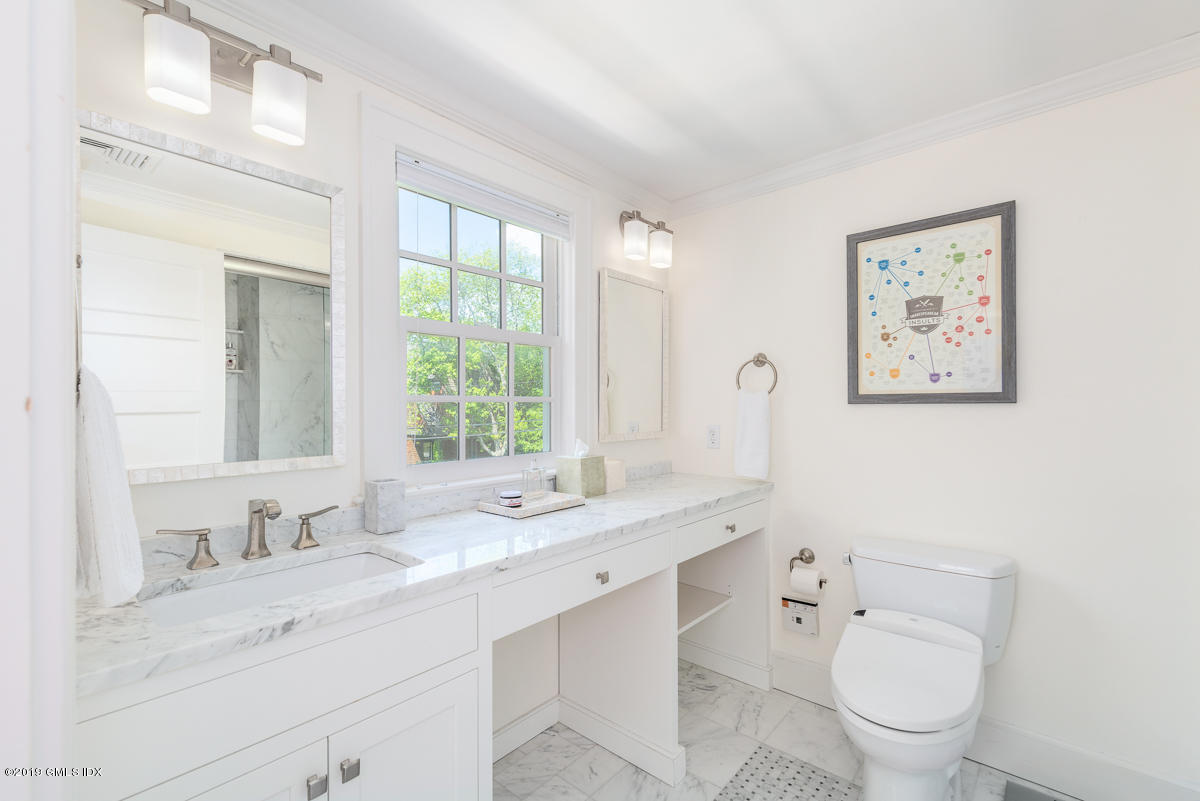 23 Maher Avenue Greenwich, CT 06830 - Photo 31 of 51 a bathroom with a granite countertop sink mirror and toilet