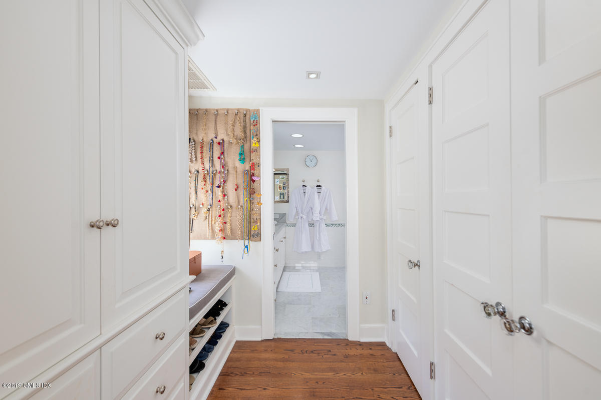 23 Maher Avenue Greenwich, CT 06830 - Photo 33 of 51 a bathroom with a tub shower sink and vanity