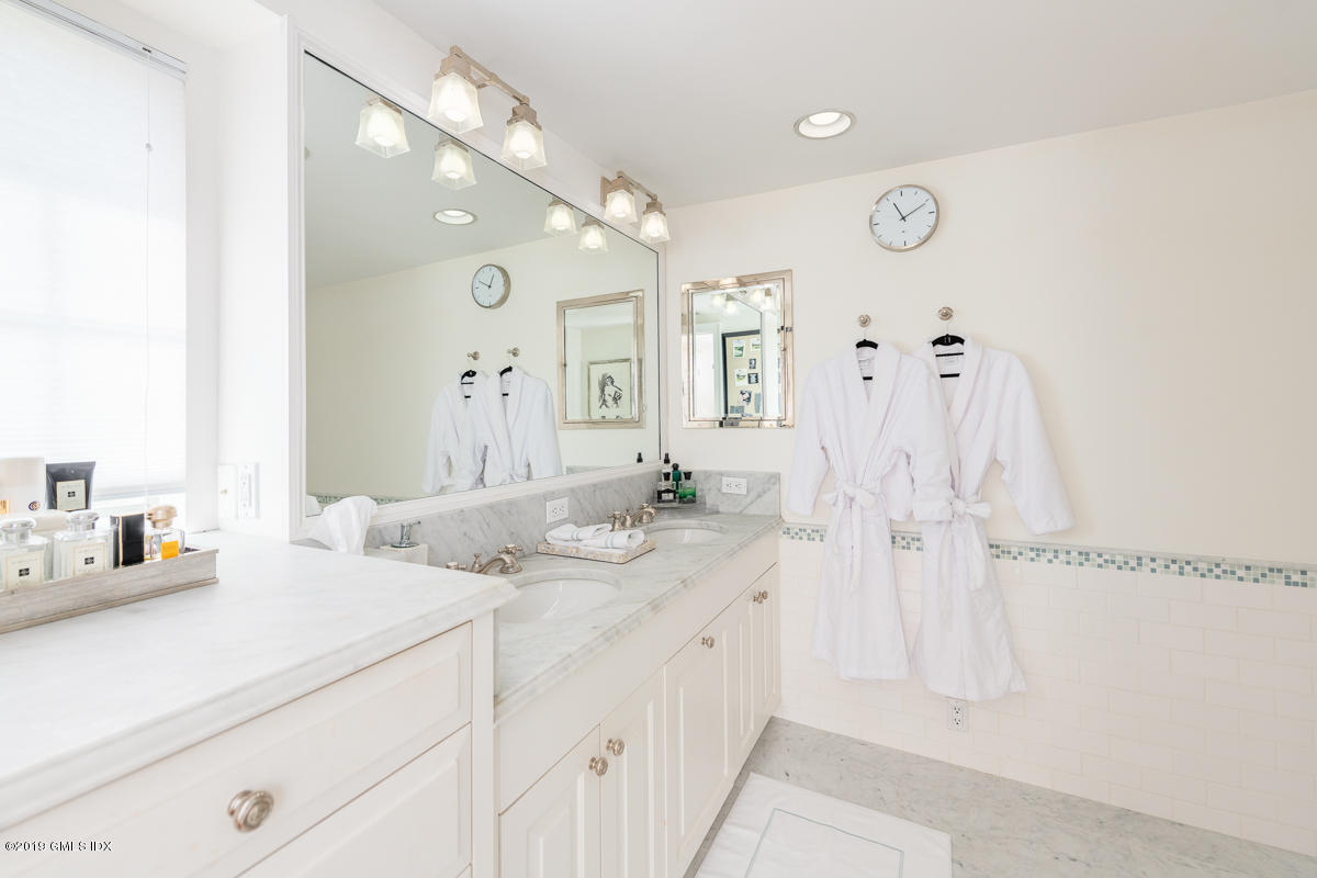 23 Maher Avenue Greenwich, CT 06830 - Photo 34 of 51 a spacious bathroom with double vanity sink and a mirror