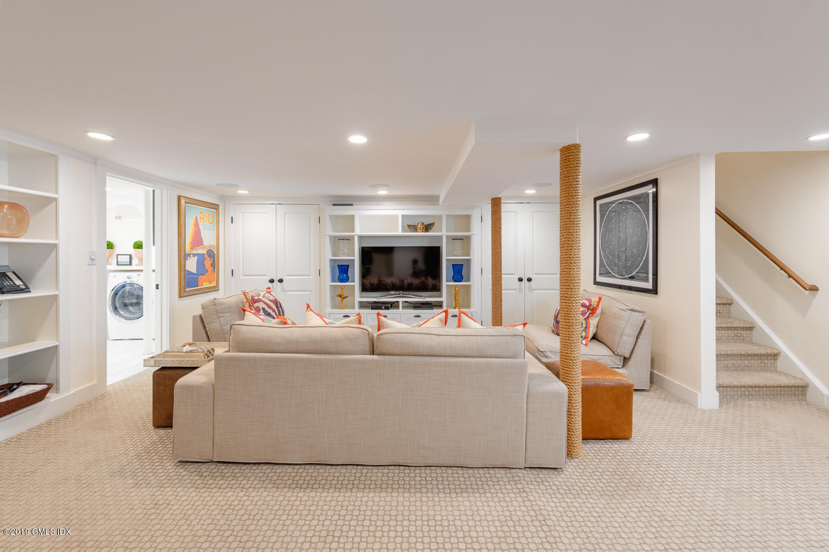 23 Maher Avenue Greenwich, CT 06830 - Photo 40 of 51 a living room with furniture and a flat screen tv