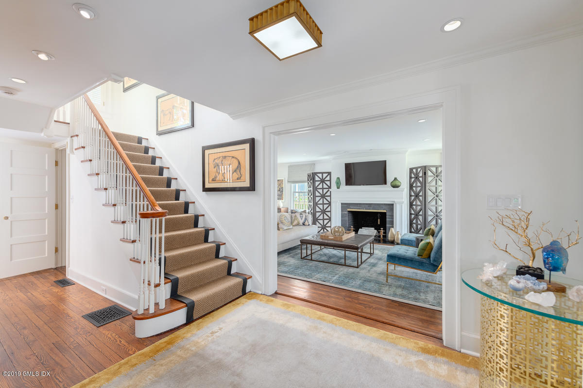 23 Maher Avenue Greenwich, CT 06830 - Photo 6 of 51 a view of entryway and hall with wooden floor