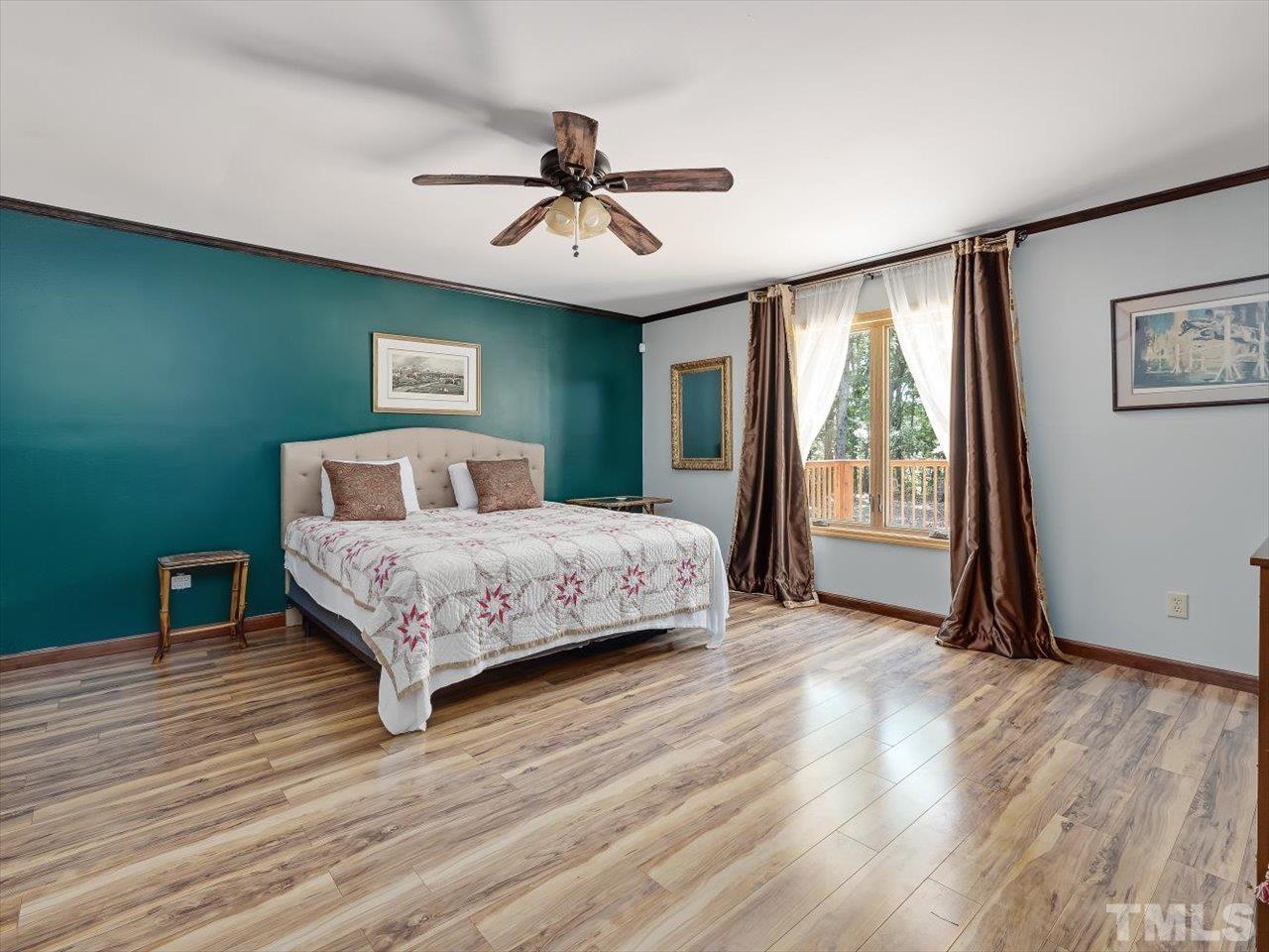 261 Ridge View Pittsboro, NC 27312 - Photo 13 of 57 a bedroom with a bed and a window