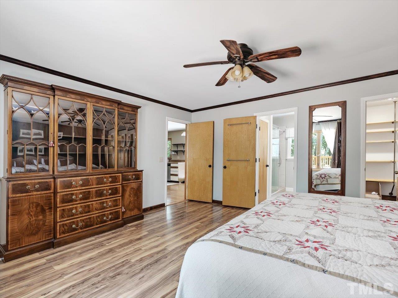 261 Ridge View Pittsboro, NC 27312 - Photo 14 of 57 a bedroom with a bed and a dresser