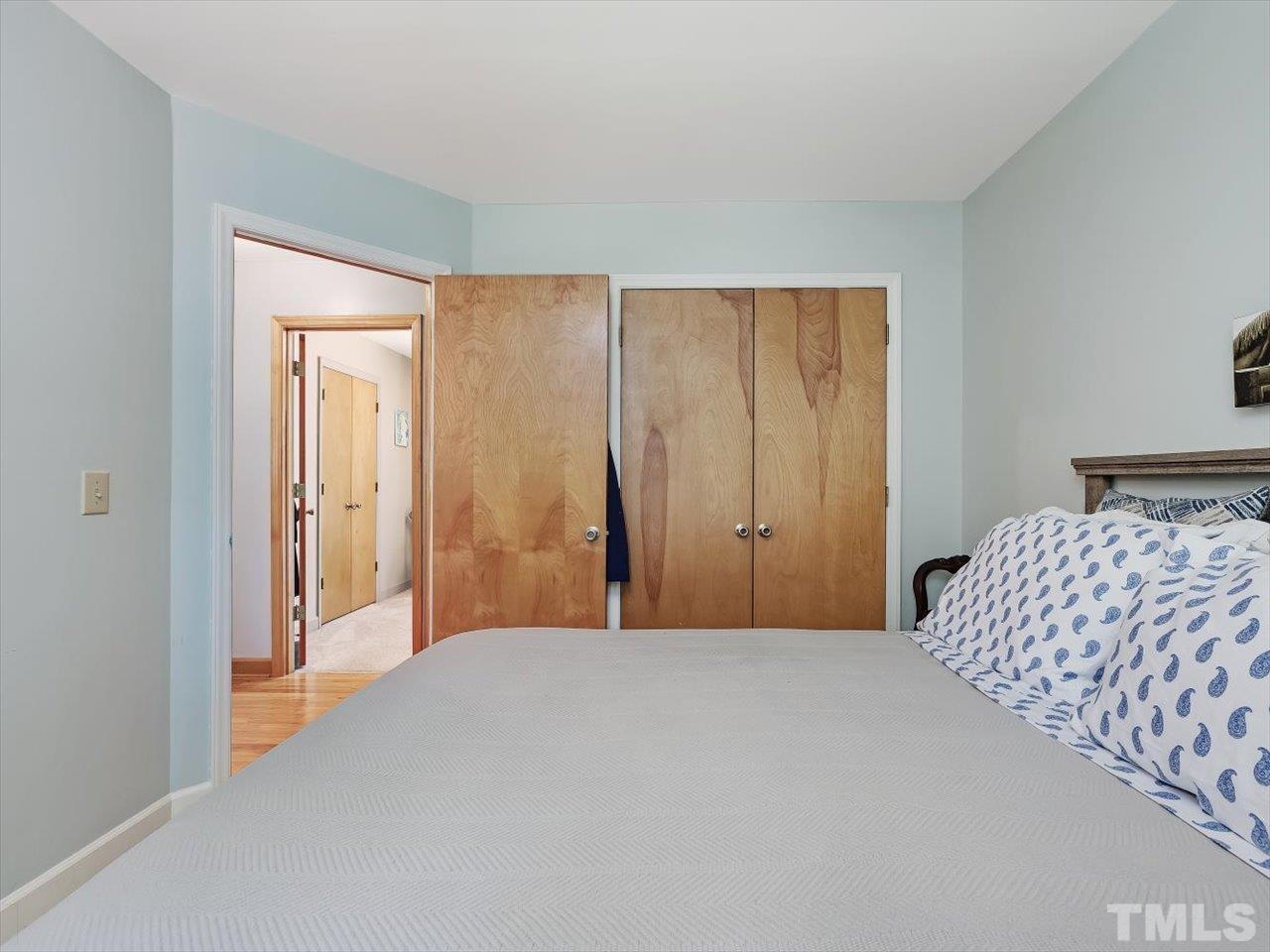 261 Ridge View Pittsboro, NC 27312 - Photo 20 of 57 a bedroom with a bed and a mirror