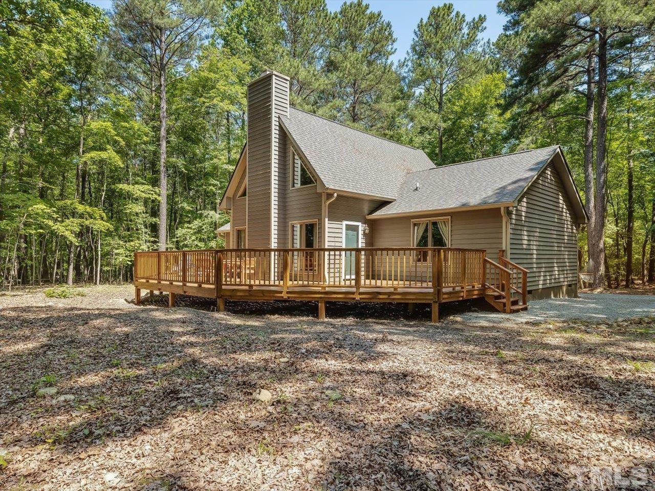 261 Ridge View Pittsboro, NC 27312 - Photo 2 of 57 a view of a house with a yard