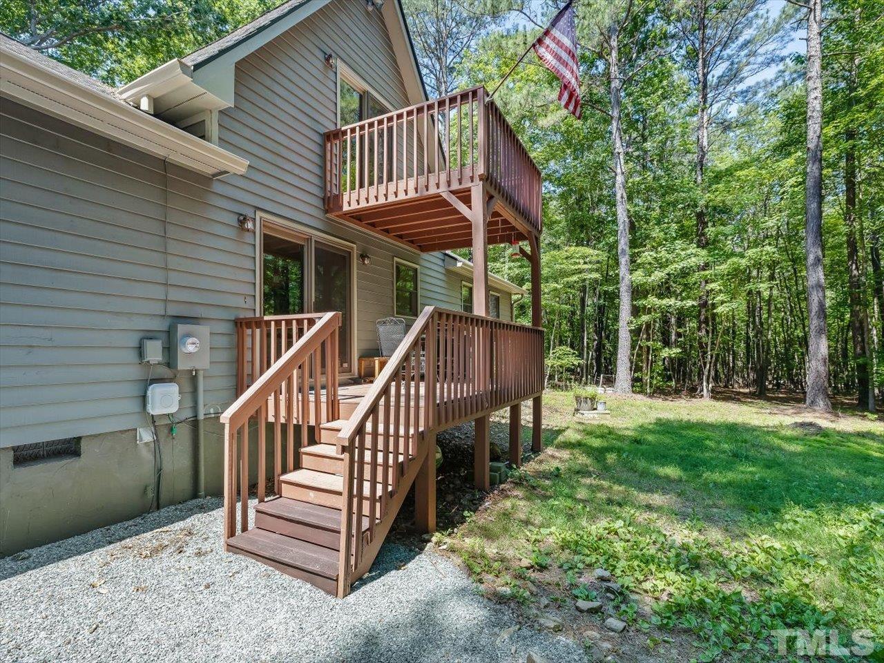 261 Ridge View Pittsboro, NC 27312 - Photo 35 of 57 a view of backyard with deck and outdoor seating