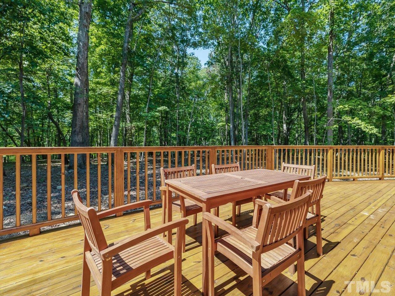 261 Ridge View Pittsboro, NC 27312 - Photo 39 of 57 a view of a chairs and table on the deck