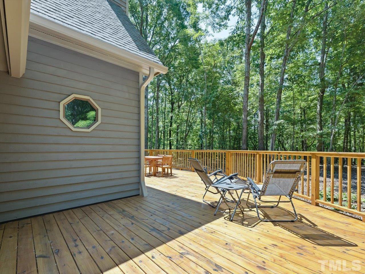 261 Ridge View Pittsboro, NC 27312 - Photo 41 of 57 a view of sitting area with furniture on wooden deck