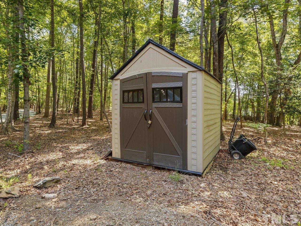261 Ridge View Pittsboro, NC 27312 - Photo 44 of 57 a front view of a house with a yard
