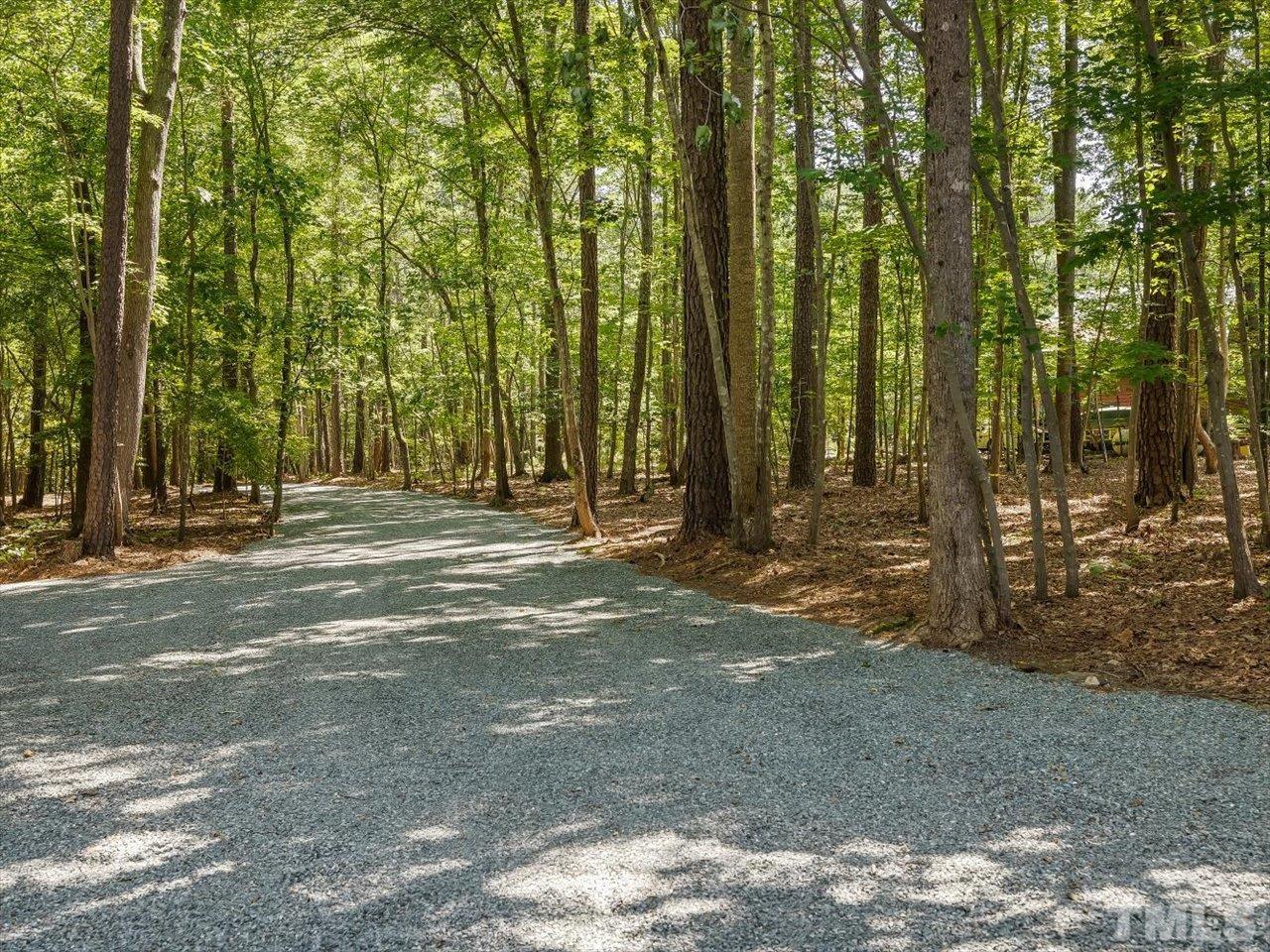261 Ridge View Pittsboro, NC 27312 - Photo 50 of 57 a view of outdoor space with deck and trees