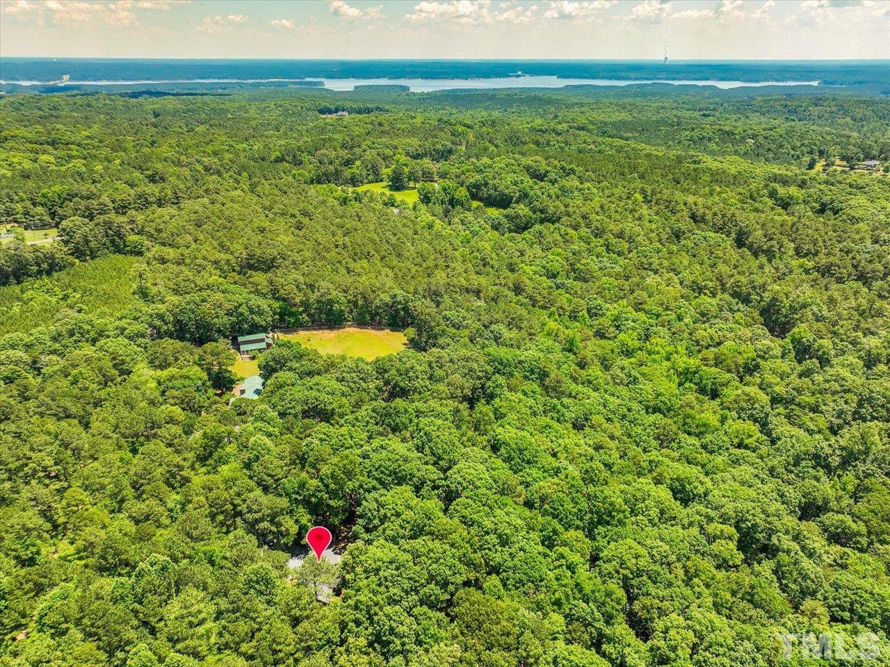 261 Ridge View Pittsboro, NC 27312 - Photo 53 of 57 a view of a green field with an ocean view