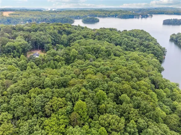 an aerial view of a houses with outdoor space