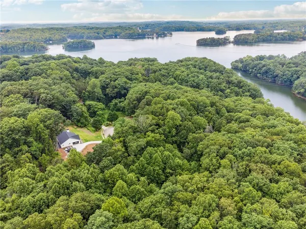 a view of a lake with a house