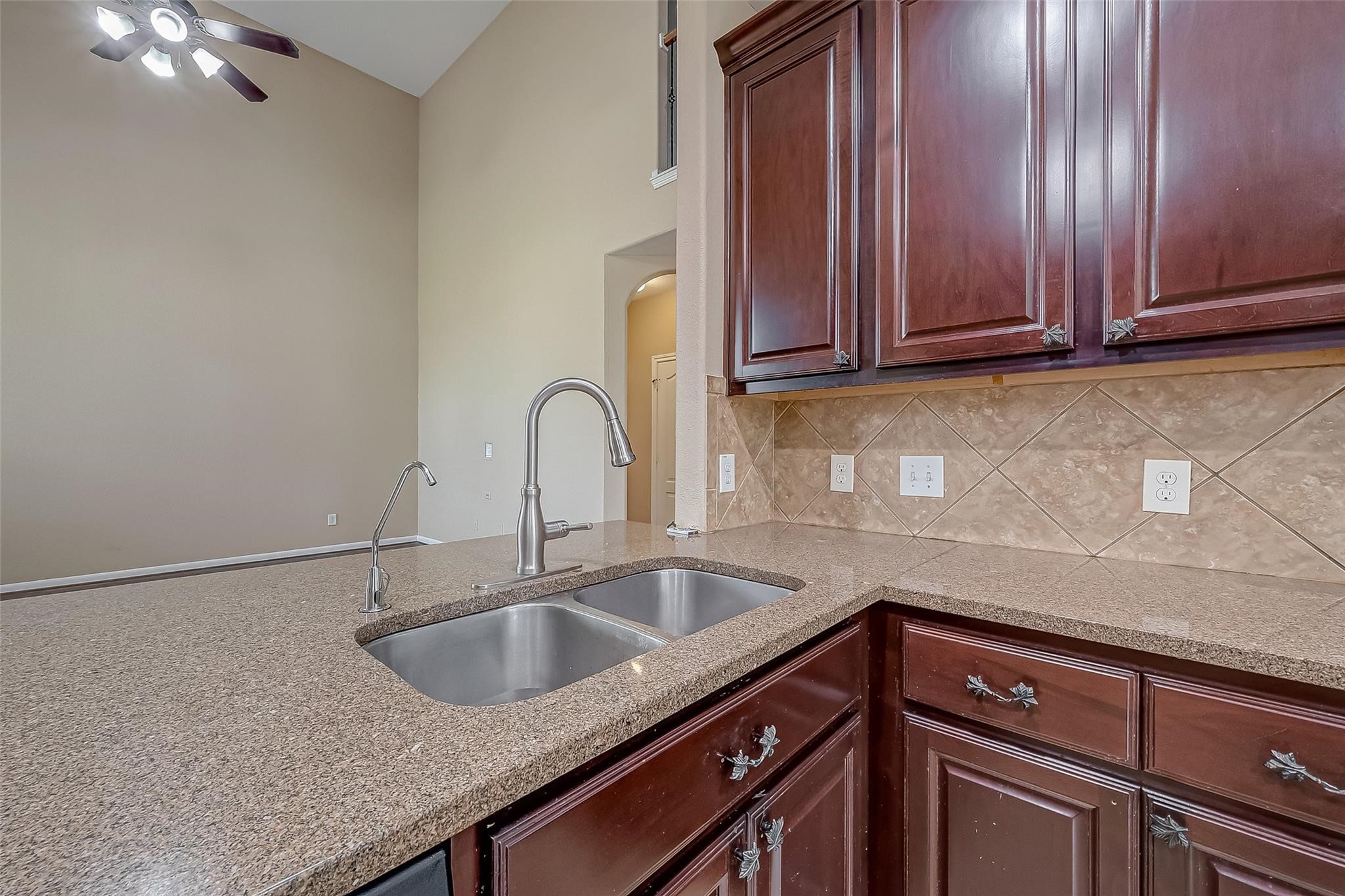 21831 Mount Hunt Drive Spring, TX 77388 - Photo 19 of 47 a kitchen with a sink and cabinets