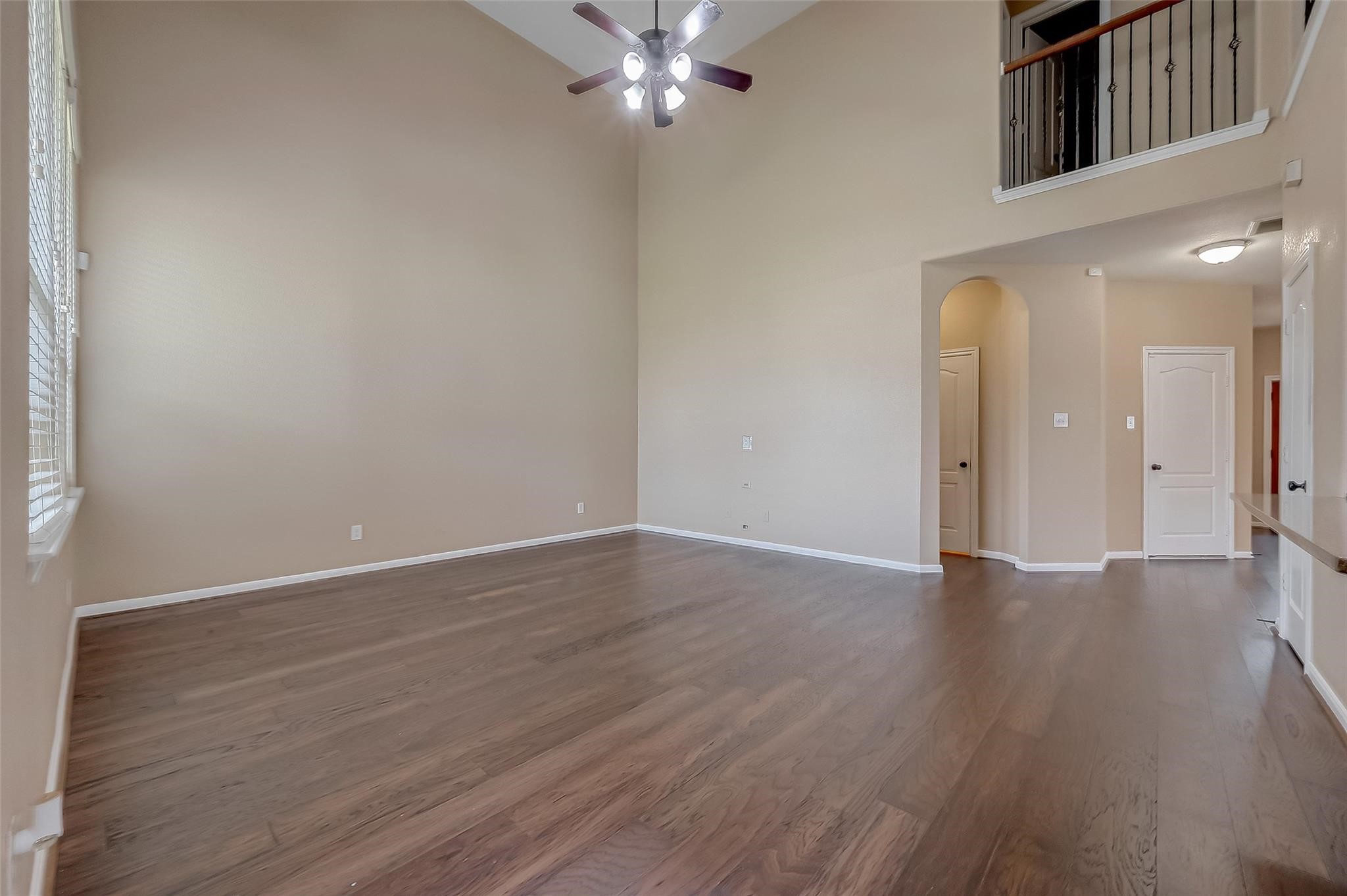 21831 Mount Hunt Drive Spring, TX 77388 - Photo 23 of 47 a view of an empty room with wooden floor