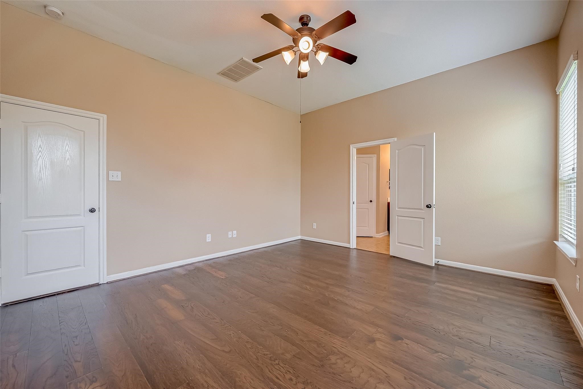 21831 Mount Hunt Drive Spring, TX 77388 - Photo 29 of 47 a view of an empty room with wooden floor