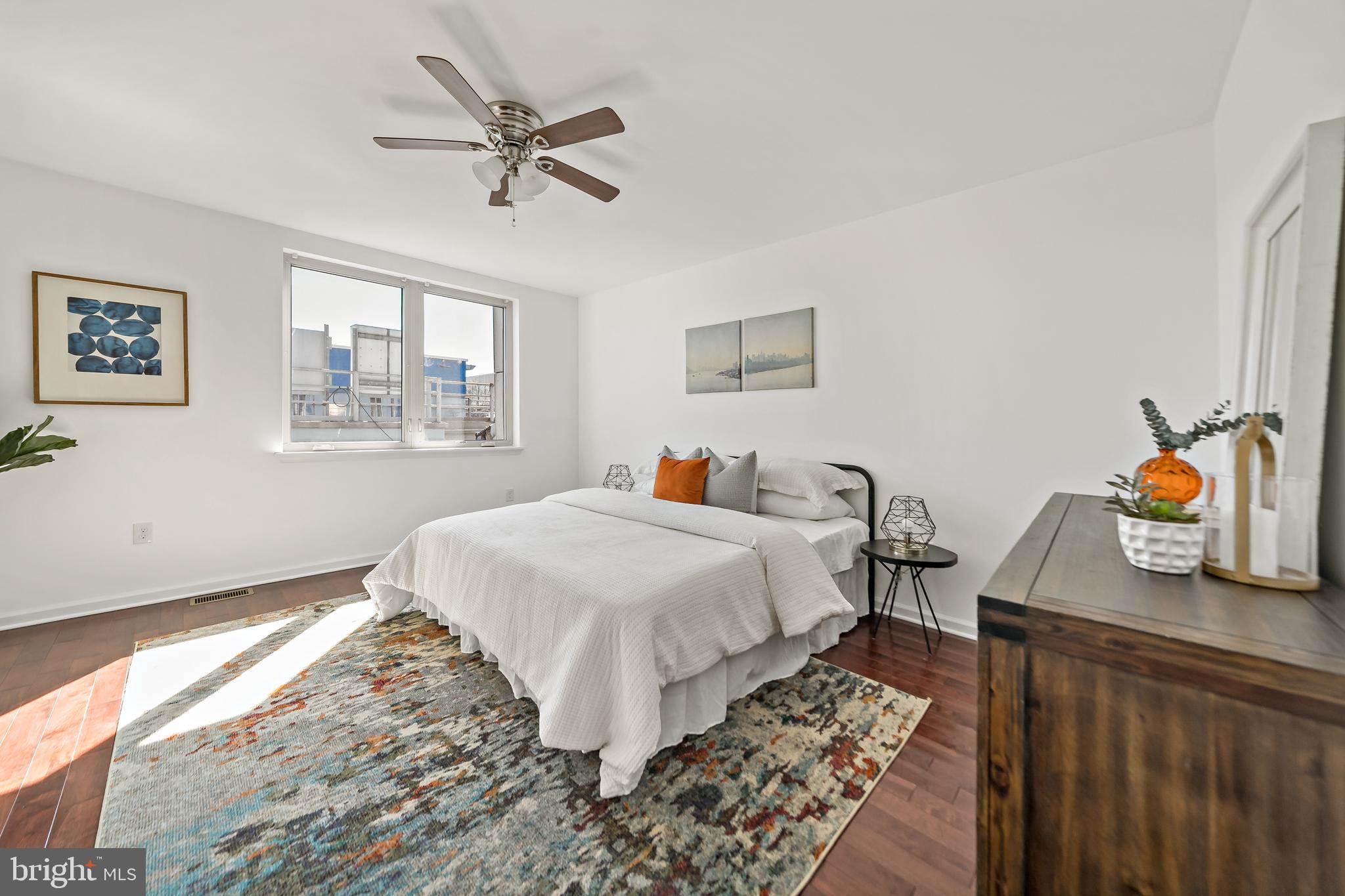 1816 North Front Street, Unit B Philadelphia, PA 19122 - Photo 9 of 19 a bedroom with bed and a window