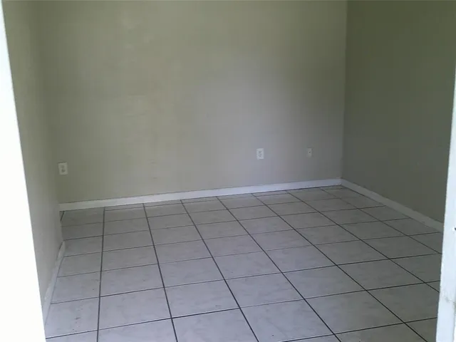 a bathroom with a sink toilet and a mirror