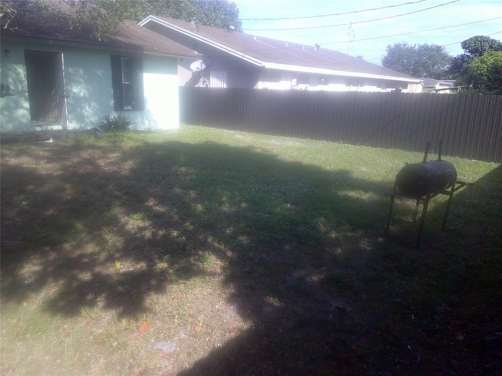 Undisclosed Address Opa-Locka, FL 33054 - Photo 9 of 9 a view of a yard