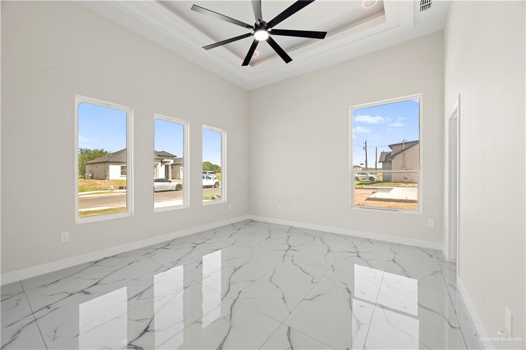 801 Falcon Street Rio Grande City, TX 78582 - Photo 12 of 36 a view of an empty room and window