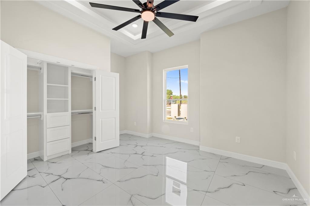 801 Falcon Street Rio Grande City, TX 78582 - Photo 13 of 36 a view of an empty room with a window