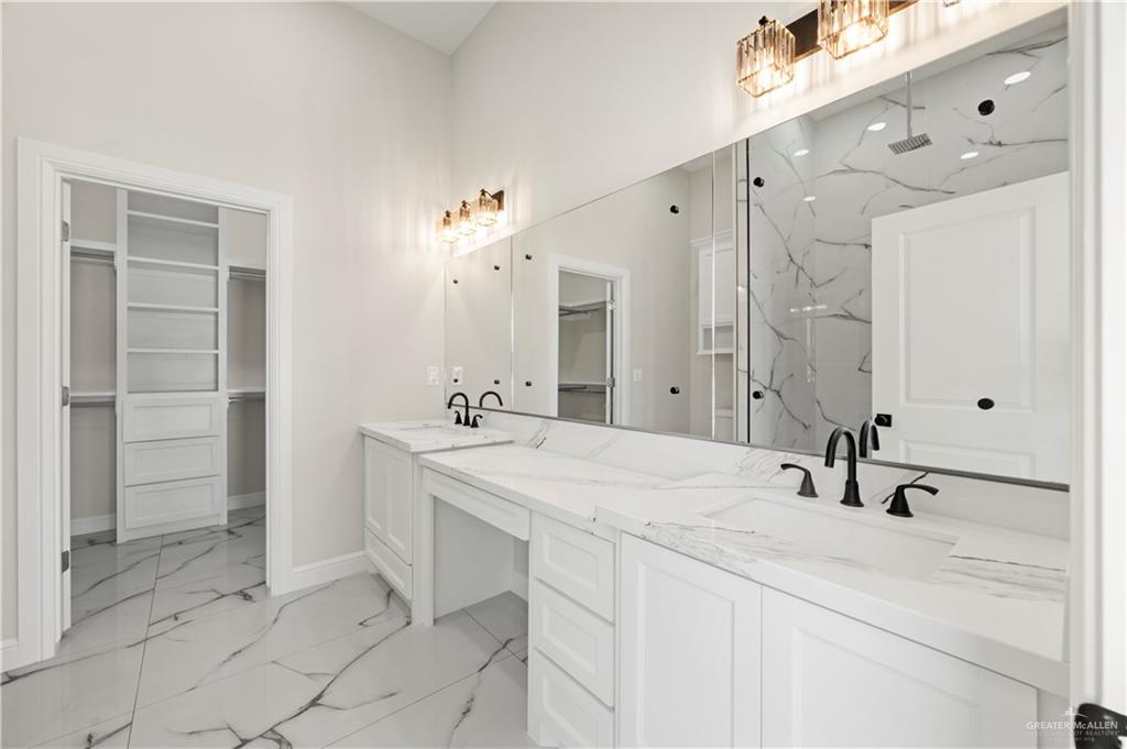 801 Falcon Street Rio Grande City, TX 78582 - Photo 19 of 36 a bathroom with a sink and a mirror
