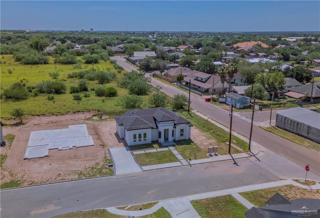 801 Falcon Street Rio Grande City, TX 78582 - Photo 22 of 36 an aerial view of a house with a garden