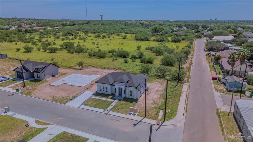 801 Falcon Street Rio Grande City, TX 78582 - Photo 23 of 36 an aerial view of a house with a garden