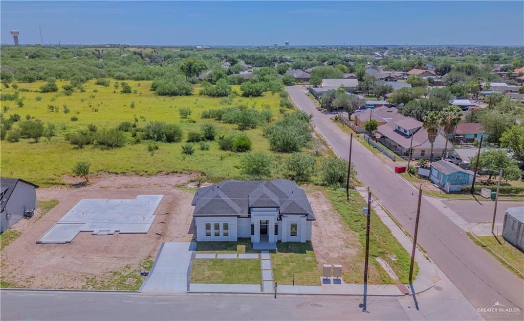801 Falcon Street Rio Grande City, TX 78582 - Photo 24 of 36 an aerial view of a house with a yard and lake view