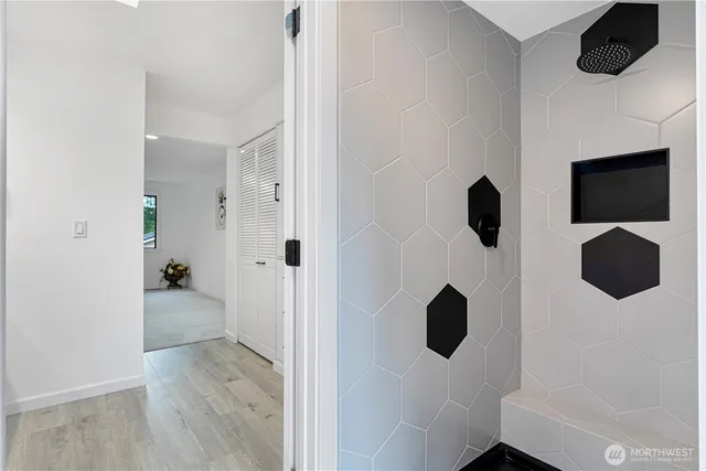 a bathroom with a sink and a mirror