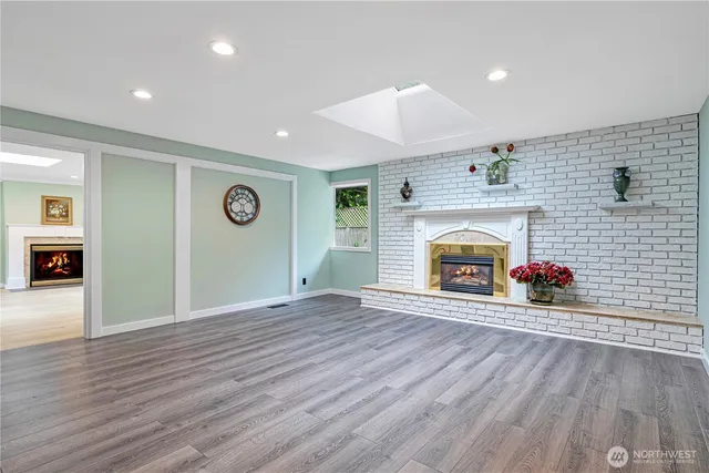 a view of a livingroom with wooden floor