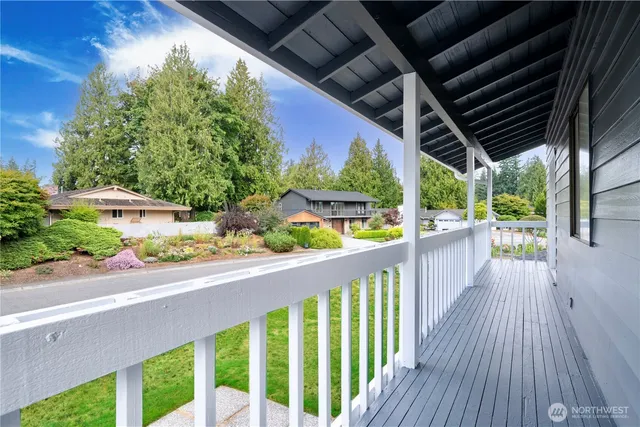 a view of a house with potted plants