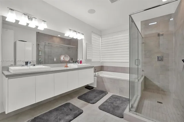 a white toilet sitting next to a shower curtain