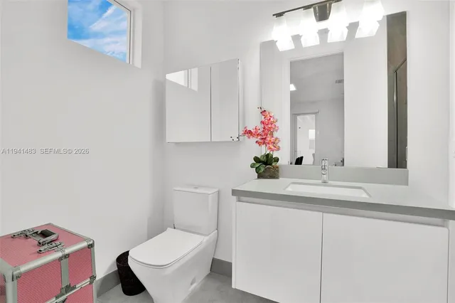 a view of a livingroom with furniture and a fireplace