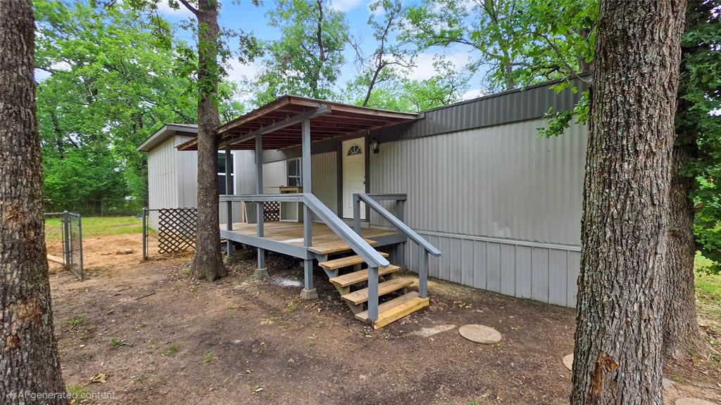 111 Custer Mabank, TX 75156 - Photo 16 of 20 a house view with a backyard space
