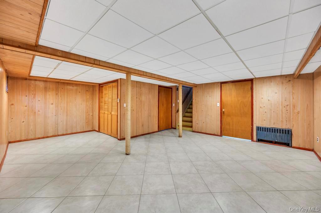 2585 Oceanside Road Oceanside, NY 11572 - Photo 20 of 30 a view of an empty room with a window
