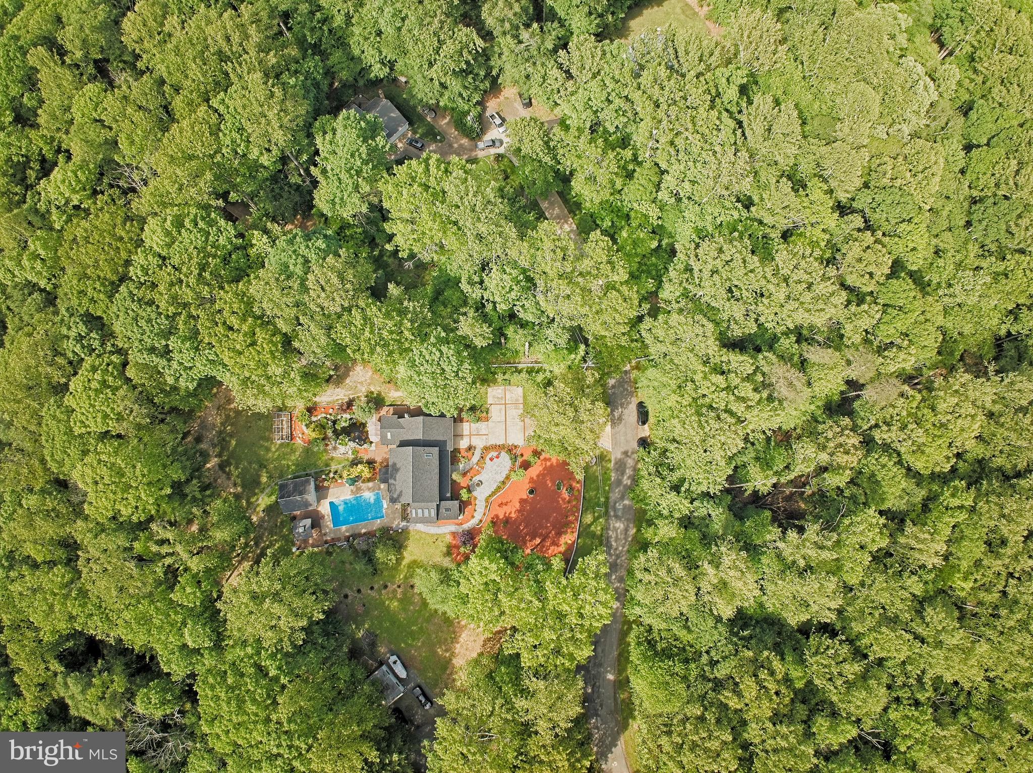 14520 Idlebrook Court Manassas, VA 20112 - Photo 13 of 87 a view of a yard with a tree