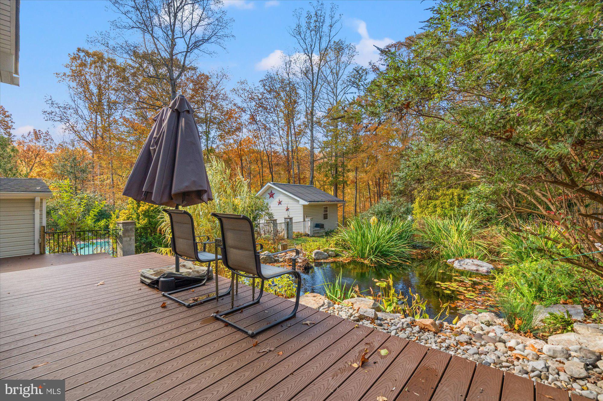 14520 Idlebrook Court Manassas, VA 20112 - Photo 31 of 87 a view of a chairs and table on the wooden floor