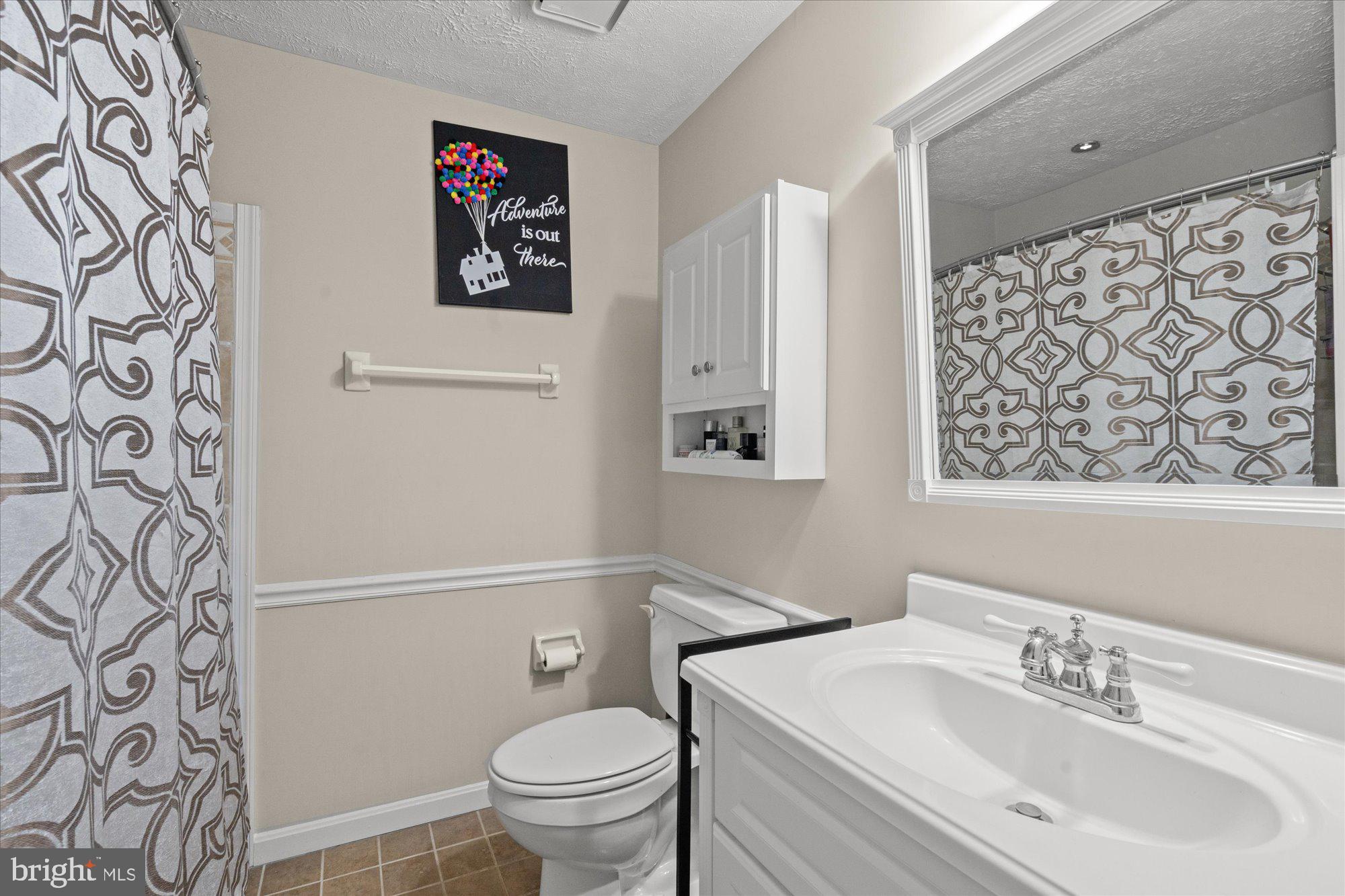 14520 Idlebrook Court Manassas, VA 20112 - Photo 36 of 87 a bathroom with a sink and a toilet