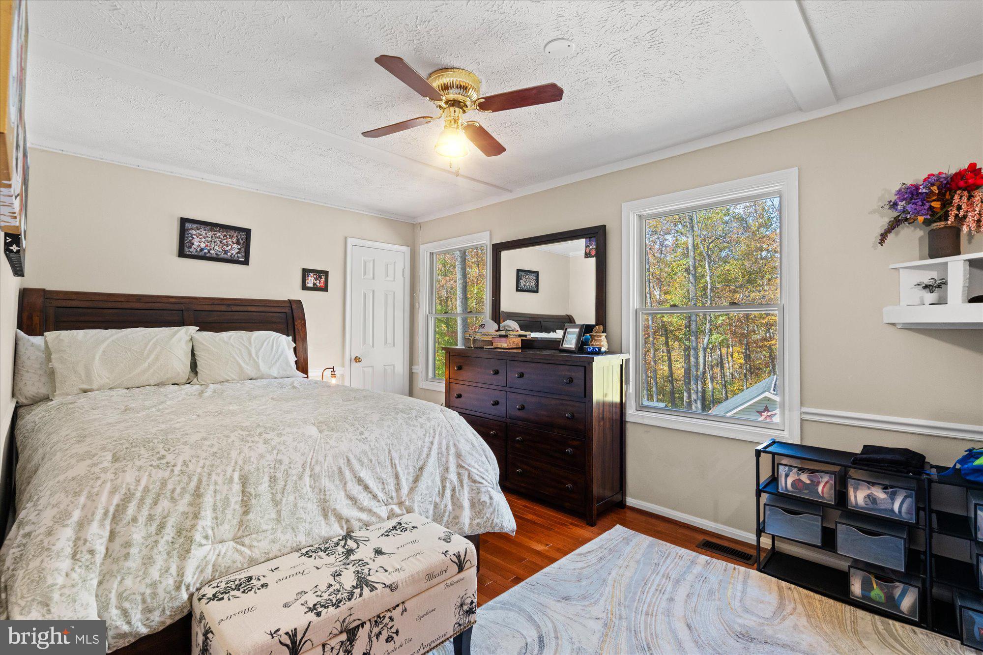 14520 Idlebrook Court Manassas, VA 20112 - Photo 43 of 87 a bed room with a bed and a window