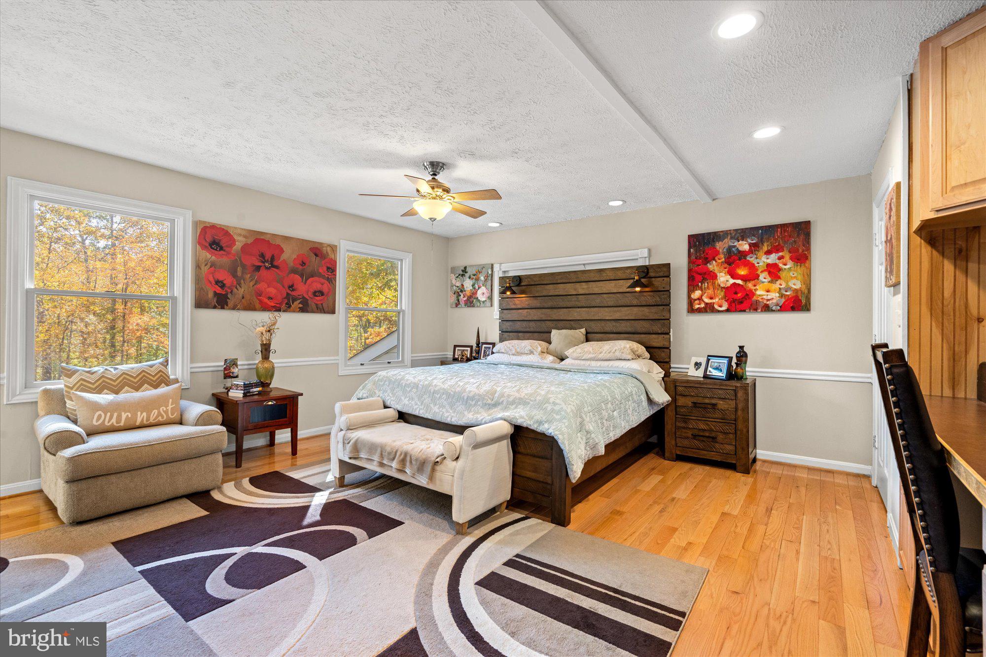 14520 Idlebrook Court Manassas, VA 20112 - Photo 54 of 87 a bedroom with 2 bed and a couch