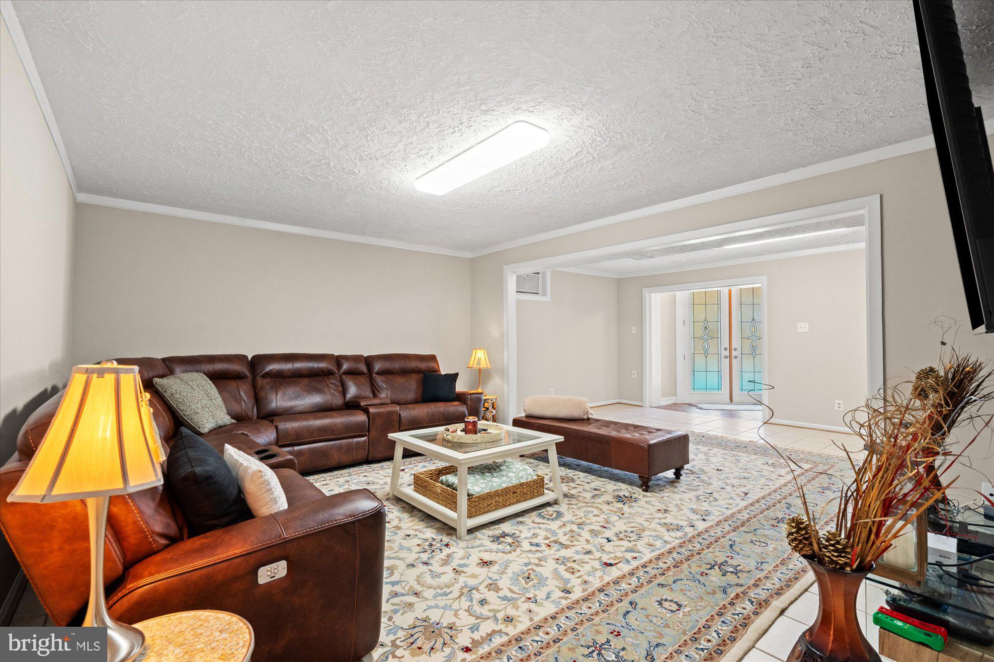 14520 Idlebrook Court Manassas, VA 20112 - Photo 62 of 87 a living room with furniture and a couch